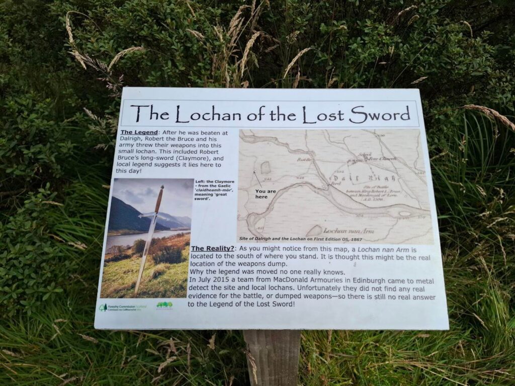 Information board describing the Lochan of the Lost Sword legend